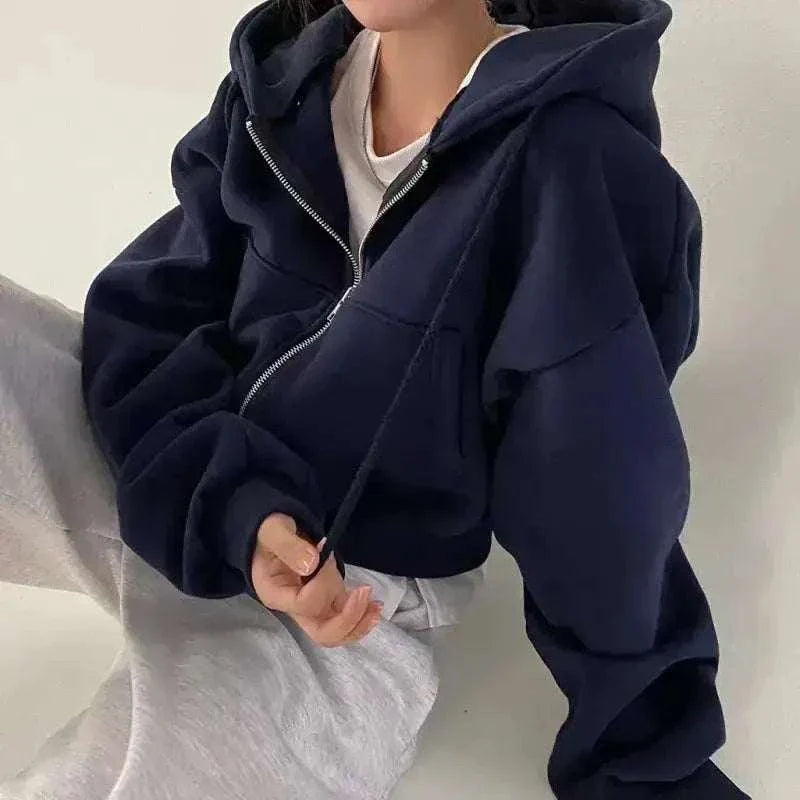 2024 Spring Autumn Hooded Sweatshirt Women in navy fleece, with a relaxed fit, zip front, oversized hood and long sleeves.