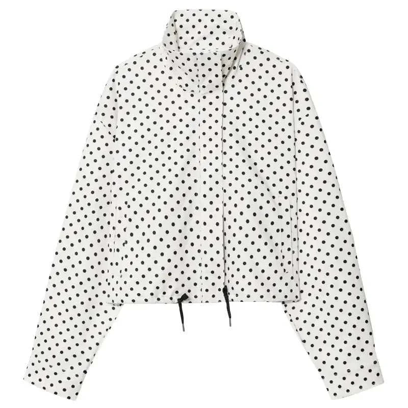 comfortable oversized polka dot bomber jacket in white fabric with black dots, featuring a high collar, front zip, and drawstring hem