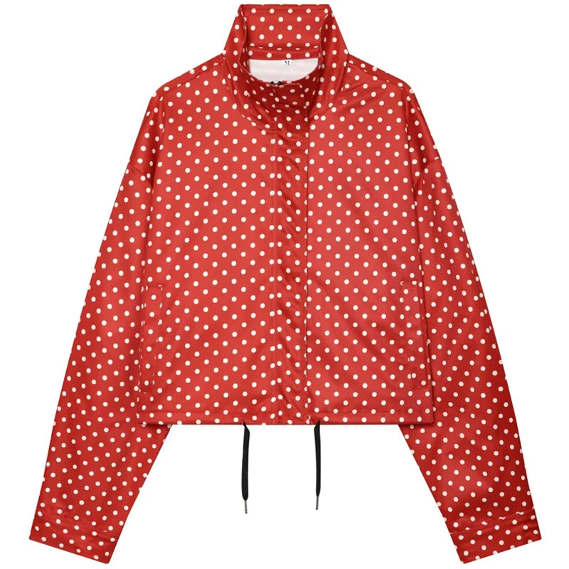 Comfortable oversized polka dot bomber jacket in red fabric with white dots, a high collar, front buttons, and drawstrings.