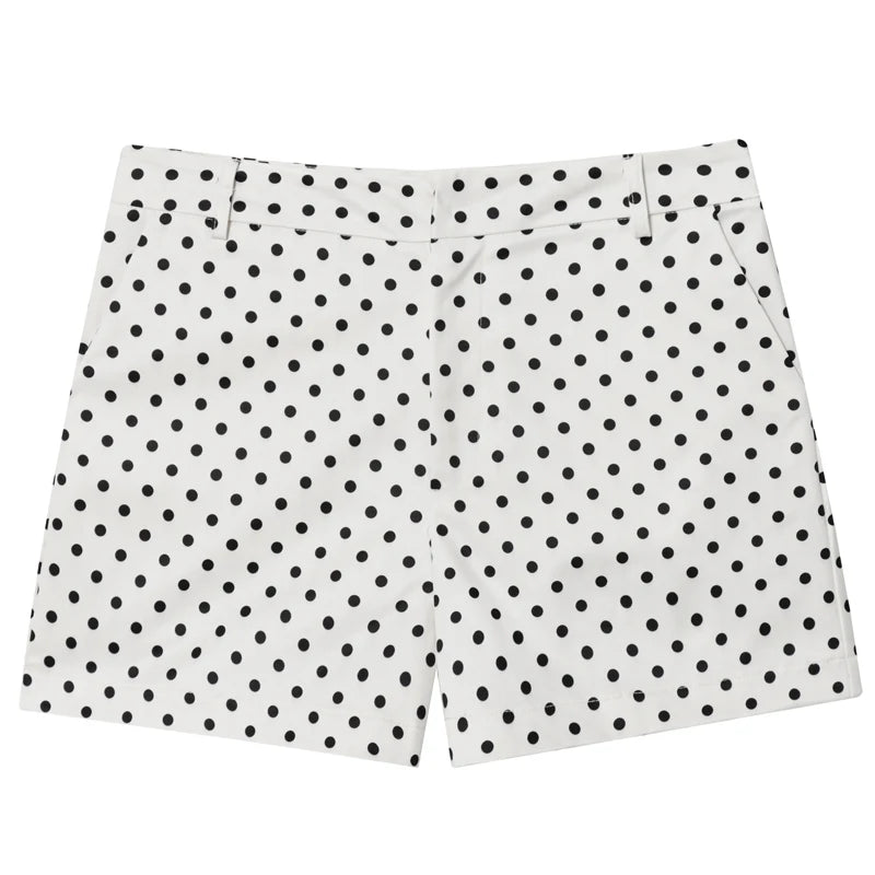 White woven shorts with black polka dots, belt loops, side pockets and a front fly; comfortable oversized polka dot bomber jacket is not pictured.