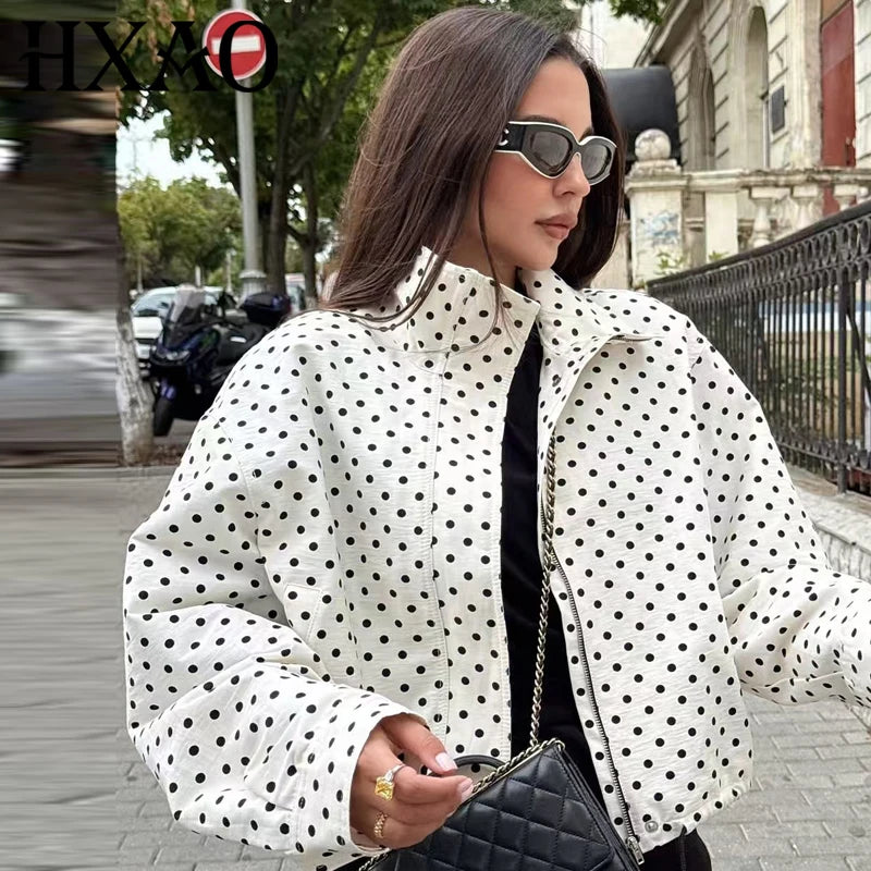 comfortable oversized polka dot bomber jacket in white fabric with black dots, featuring a cropped shape and voluminous sleeves