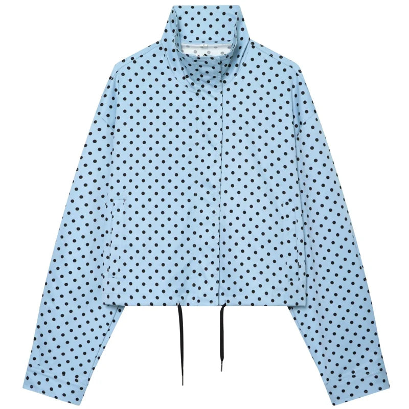 comfortable oversized polka dot bomber jacket in light blue fabric with black spots, high collar, zip front and drawstring hem
