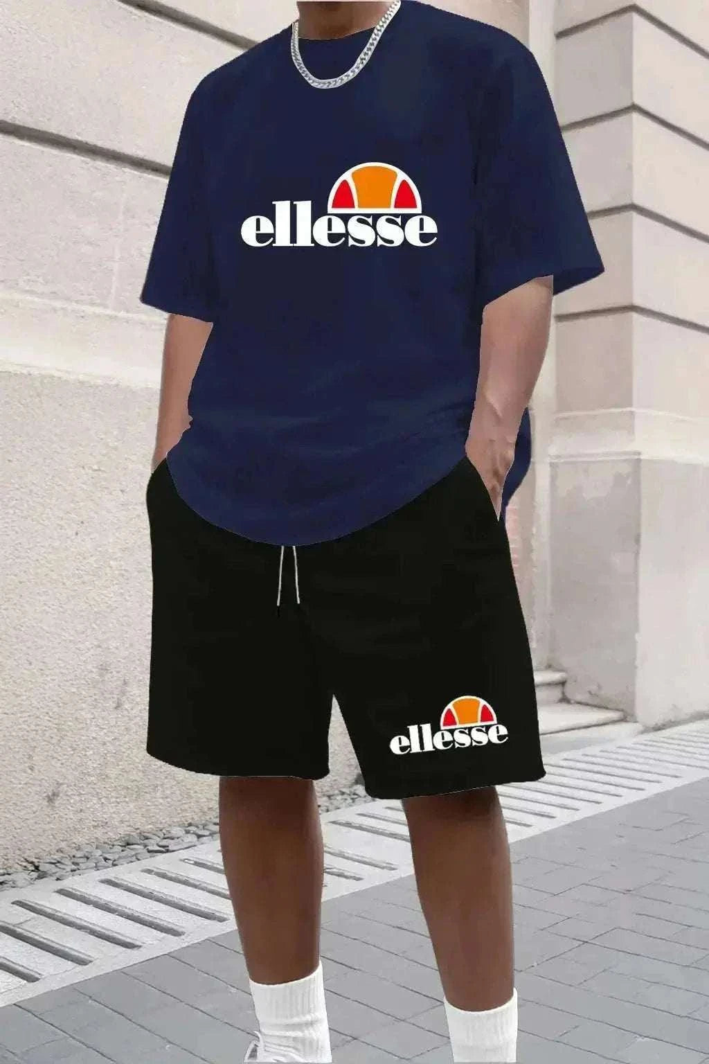 New Men's Casual and Fashionable Outdoor Clothing features a navy Ellesse T-shirt and black shorts with white logo prints